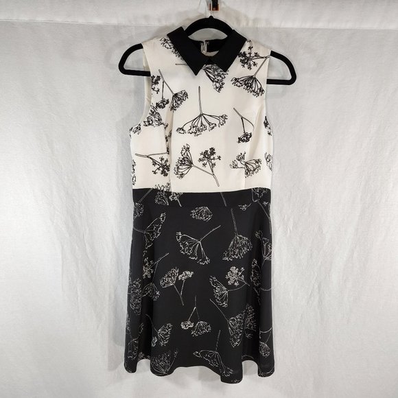 CeCe Dresses & Skirts - CeCe Black/Off White Collar Stand Sleeveless Floral Mini Dress Size 6 LIKE NEW!